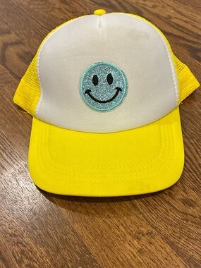 Yellow and White Trucker Hat with Teal Smiley Patch